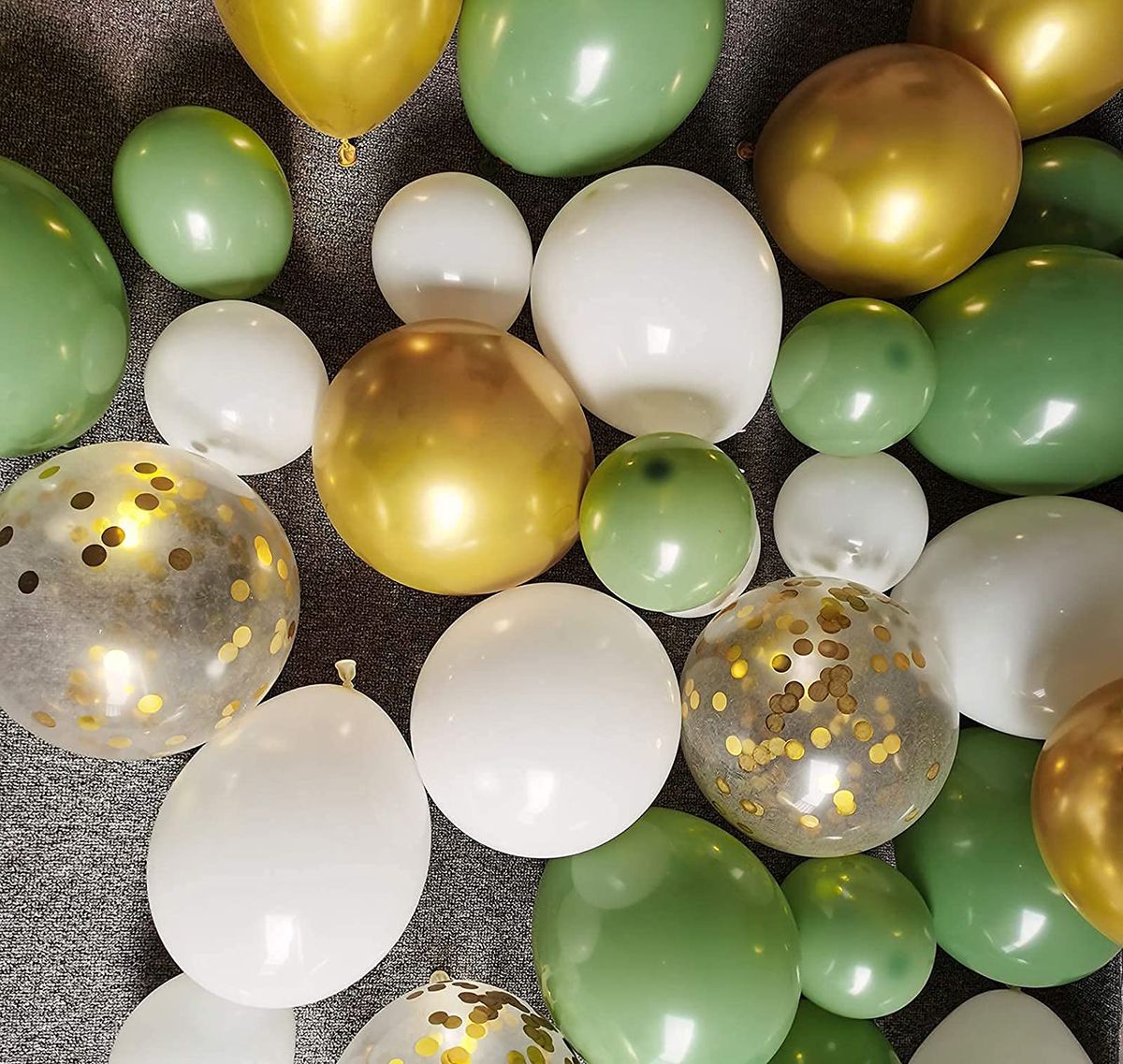 Jungle Safari Balloons on floor white gold green and gold confetti