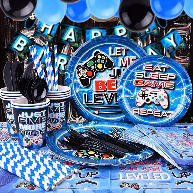 blue level up gamer table setting with paper plates cups and balloons with happy birthday bunting