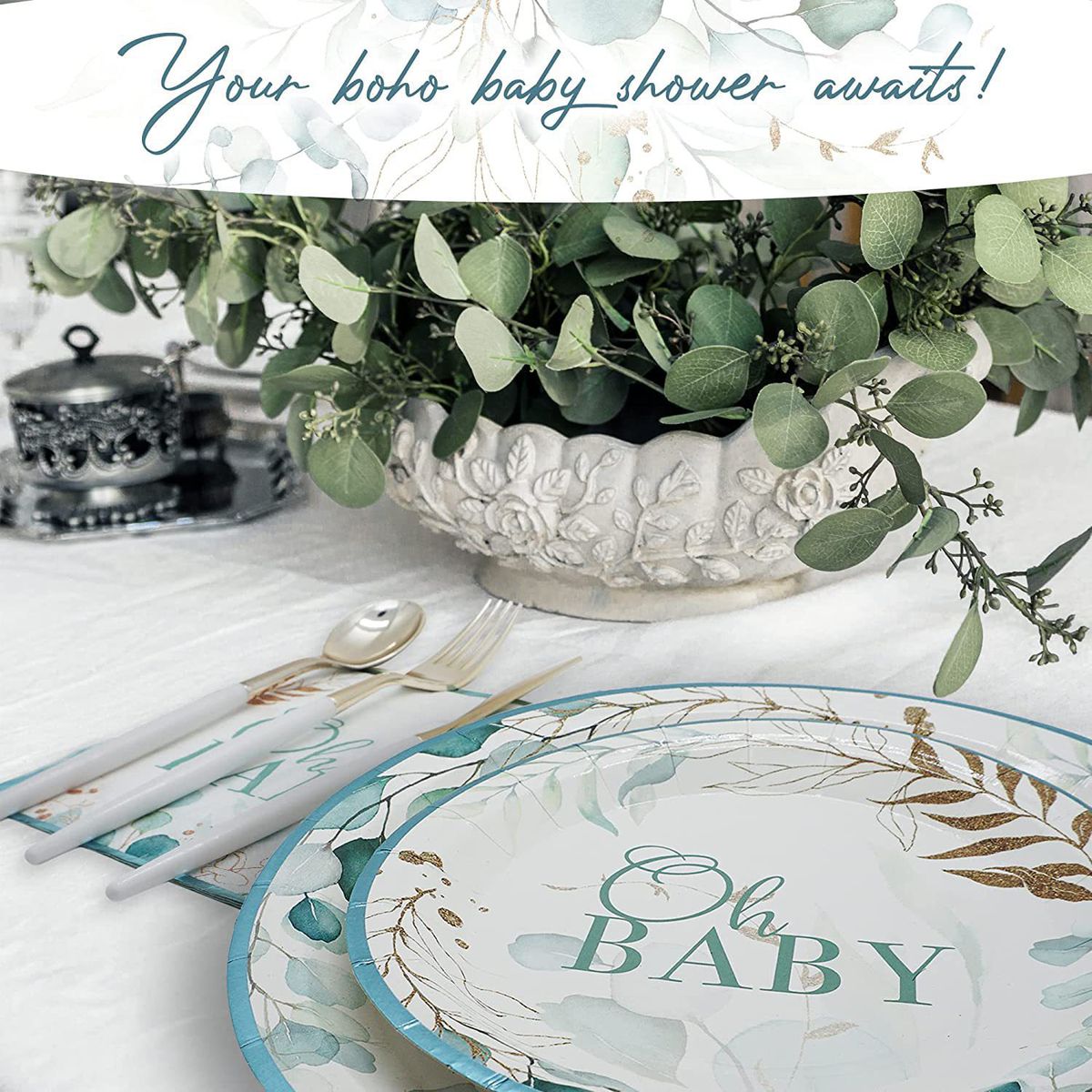 oh baby blue paper plates and serviettes on tabletop with greenery display