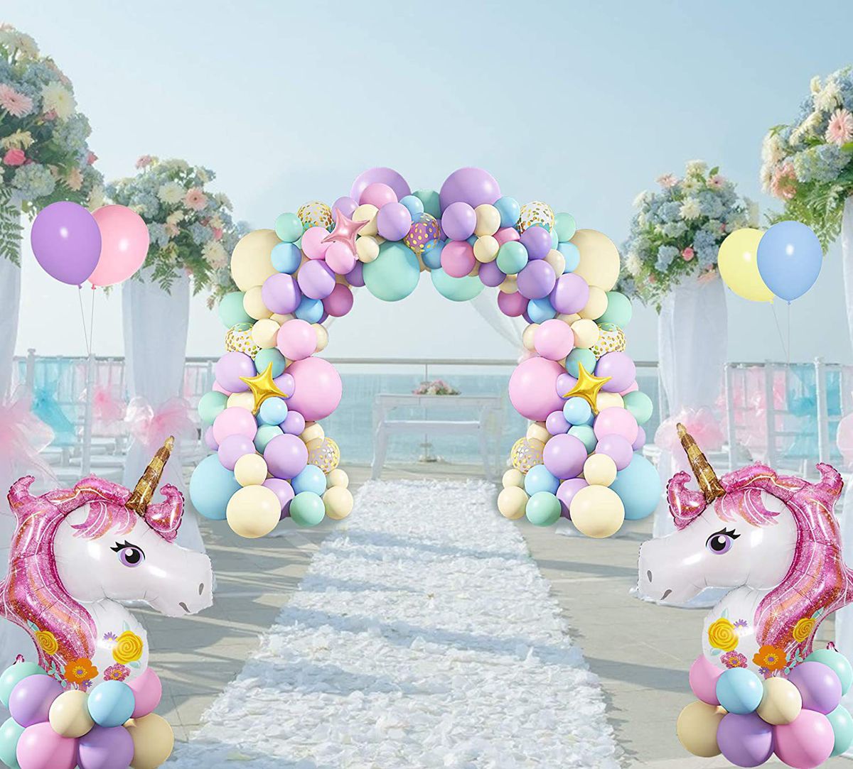 lifestyle image of shimmer and confetti unicorn balloon arch